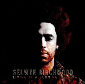 SELWYN BIRCHWOOD: “Living In A Burning House” cover album